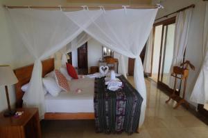 Private Luxury Villa Celagi - with large infinity pool and ocean view客房内的一张或多张床位
