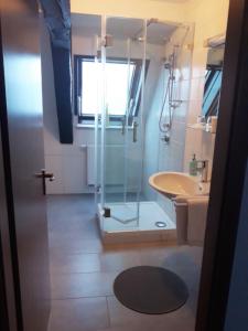 Koupelna v ubytování Hotel Luca