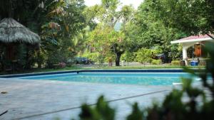 Bazén v ubytování Hotel Campestre El Escape nebo v jeho okolí
