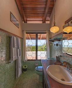 Ett badrum på Villa Mango B&B