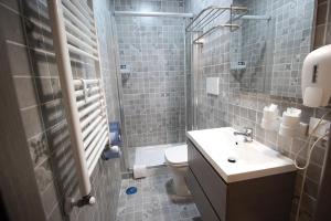 Koupelna v ubytování Quest House Lihong