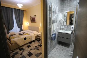 Postel nebo postele na pokoji v ubytování Quest House Lihong