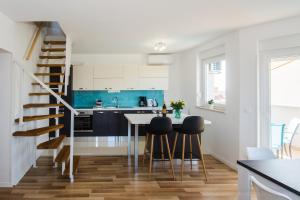 Kuchyň nebo kuchyňský kout v ubytování Apartment AleMar