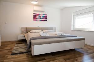 Postel nebo postele na pokoji v ubytování Apartment AleMar