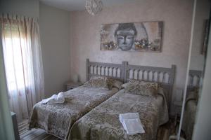 Postel nebo postele na pokoji v ubytování Villa Castro