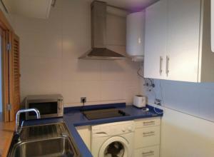 Kuchyň nebo kuchyňský kout v ubytování Apartamento Playa Salinas Roquetas de Mar