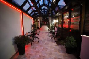 Restoran või mõni muu söögikoht majutusasutuses Garni Hotel Laguna Lux