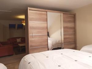 Postel nebo postele na pokoji v ubytování Ethan House Holiday Suites