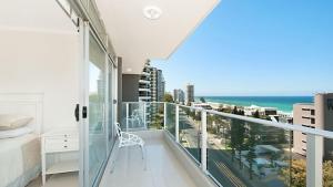 a balcony with a view of the ocean at Amira Penthouse Main Beach in Gold Coast