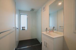 Vannituba majutusasutuses Amazing Sea Views Luxury Guest House