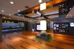 a lobby of a building with a wine cellar at Hachinohe Grand Hotel in Hachinohe