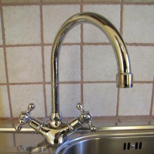 a kitchen sink with a chrome kitchen faucet at B&B Agon in Taormina