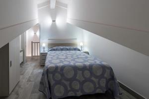 Posteľ alebo postele v izbe v ubytovaní Apartamentos Turísticos el Pontón