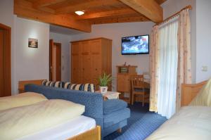 Telewizja i/lub zestaw kina domowego w obiekcie Landhotel Kirchenwirt