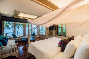 Postel nebo postele na pokoji v ubytování Barali Beach Resort Koh Chang