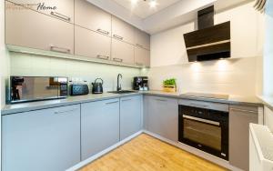Kuchyňa alebo kuchynka v ubytovaní Wonder Home - Apartamenty w zielonej okolicy, blisko centrum Karpacza