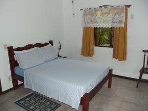 Posteľ alebo postele v izbe v ubytovaní Pousada Flats Paguru