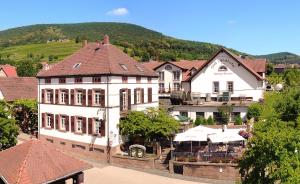 an aerial view of a building in a town at Das Landhotel Weingut Gernert in Sankt Martin