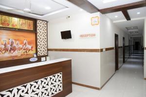 a lobby of a hospital with a reception desk at Mp Residency in Kumbakonam