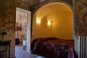 Tempat tidur dalam kamar di Agriturismo Baglio Pollicarini