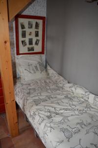 Postel nebo postele na pokoji v ubytování B&B A la Malogne