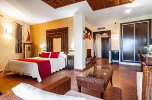 Postel nebo postele na pokoji v ubytování Hotel & Spa Sierra de Cazorla 4*