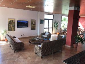 TV a/nebo společenská místnost v ubytování Residence Hotel Antica Perla