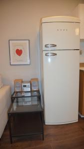 Kuchyň nebo kuchyňský kout v ubytování Apartamento Vía Romana XIX