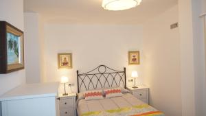 Postel nebo postele na pokoji v ubytování Apartamento Vía Romana XIX