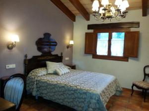 Posteľ alebo postele v izbe v ubytovaní Country House El Permanyer + 37 fotografií