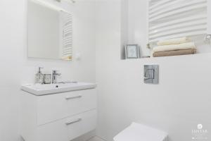 Kúpeľňa v ubytovaní Jantar Apartamenty Bliżej Morza