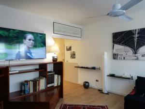 Televízia a/alebo spoločenská miestnosť v ubytovaní Cà Mocenigo Terrace
