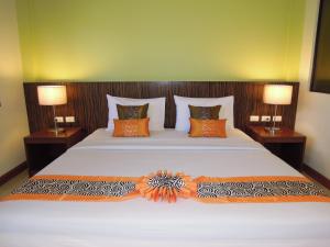 Postel nebo postele na pokoji v ubytování PS 2 Resort Phuket Patong - SHA Plus