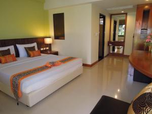 Postel nebo postele na pokoji v ubytování PS 2 Resort Phuket Patong - SHA Plus
