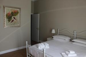 Postel nebo postele na pokoji v ubytování Casa Aydée