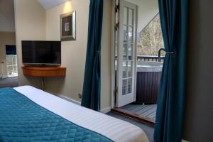 Wild Pheasant Hotel & Spa客房内的一张或多张床位