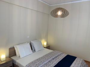 Posteľ alebo postele v izbe v ubytovaní Thiseio Big Apartment