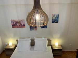 Posteľ alebo postele v izbe v ubytovaní Thiseio Big Apartment