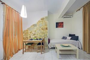 Posezení v ubytování Omega Comfy Apartments