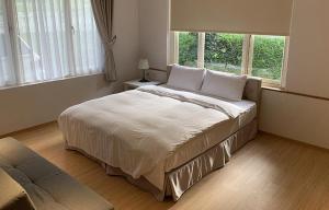 Letto o letti in una camera di American Village Resort