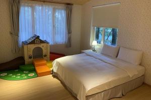 Letto o letti in una camera di American Village Resort