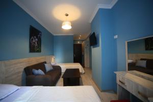 A bed or beds in a room at Hotel Soft