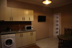 A kitchen or kitchenette at Hotel Soft