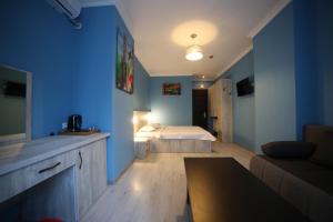 Postel nebo postele na pokoji v ubytování Hotel Soft