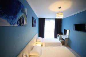 A television and/or entertainment centre at Hotel Soft