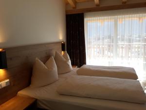 Krevet ili kreveti u jedinici u okviru objekta Hotel Jagdhof