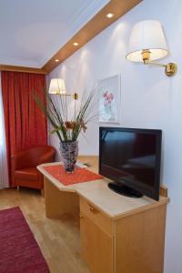 TV a/nebo společenská místnost v ubytování Pension Clara