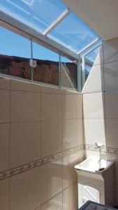 Koupelna v ubytování Apartamento próximo ao Aeroporto de Florianópolis. + 37 fotografií