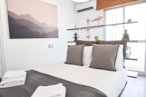 Katil atau katil-katil dalam bilik di Letmalaga Cremades Seaside