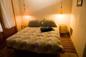 a bedroom with a large bed in a room at Palazzo Contino in Bagnoregio